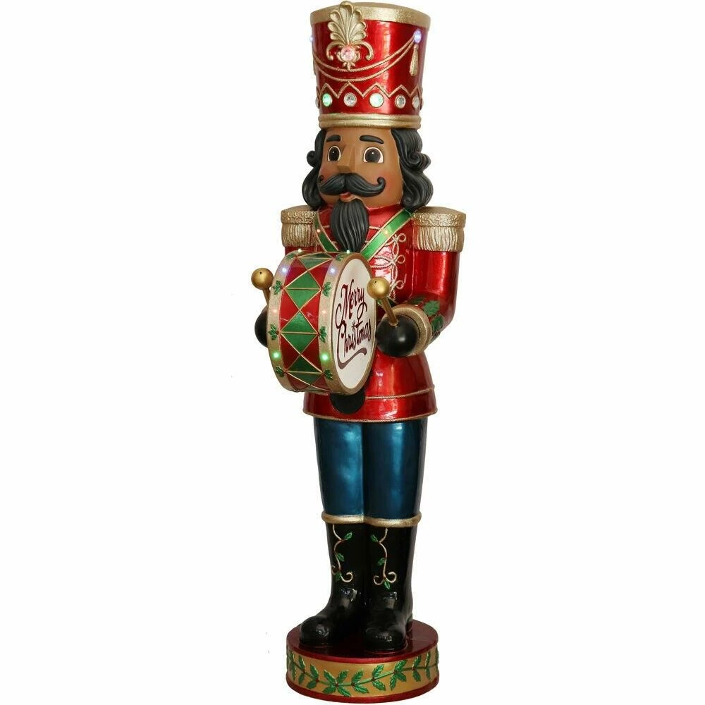 Fraser Hill Farm 5-Ft. African American Nutcracker Playing Bass Drum W/ Moving Hands, Music, Timer, 15 LED Lights 1 Fraser Hill Farm 5-Ft. African American Nutcracker Playing Bass Drum W/ Moving Hands, Music, Timer, 15 LED Lights