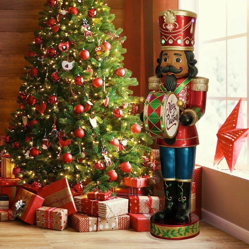 Fraser Hill Farm 5-Ft. African American Nutcracker Playing Bass Drum W/ Moving Hands, Music, Timer, 15 LED Lights 2 Fraser Hill Farm 5-Ft. African American Nutcracker Playing Bass Drum W/ Moving Hands, Music, Timer, 15 LED Lights - Image 2