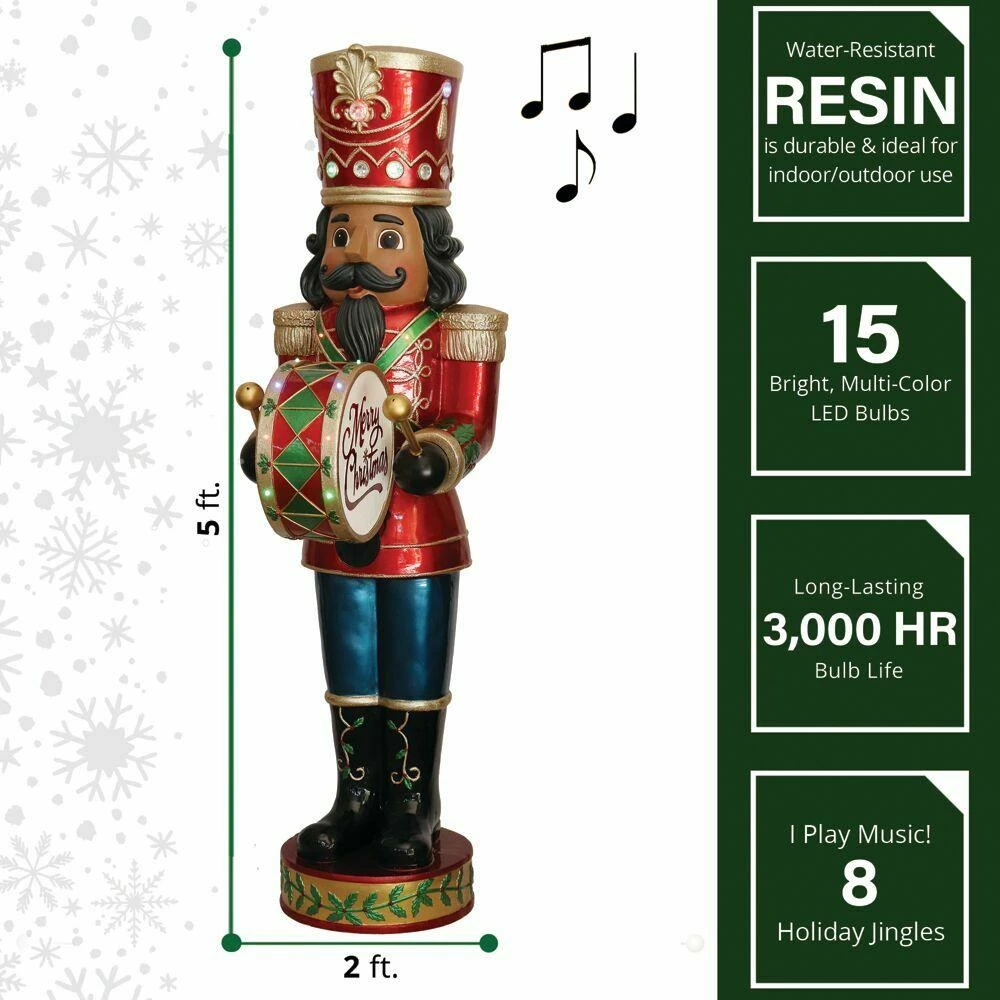 Fraser Hill Farm 5-Ft. African American Nutcracker Playing Bass Drum W/ Moving Hands, Music, Timer, 15 LED Lights 3 Fraser Hill Farm 5-Ft. African American Nutcracker Playing Bass Drum W/ Moving Hands, Music, Timer, 15 LED Lights - Image 3