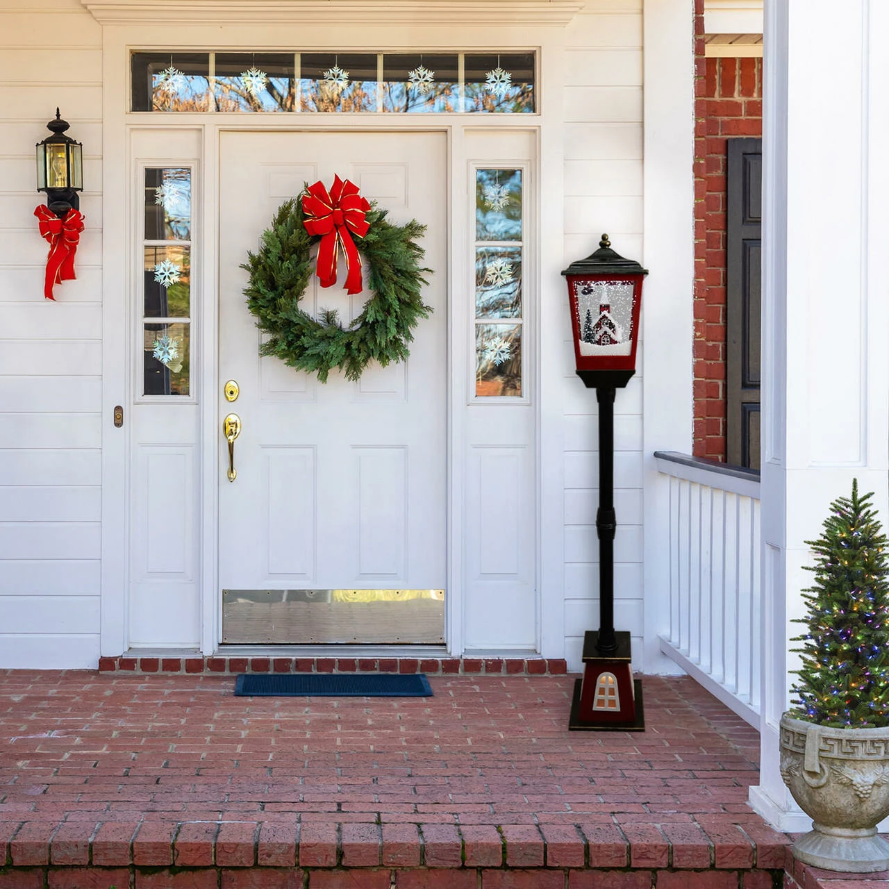 Fraser Hill Farm Let It Snow 53-In. Musical Street Lamp W/ Lighted Base, Flying Santa, Cascading Snow, And Christmas Carols, Black/Bronze/Red 2 Fraser Hill Farm Let It Snow 53-In. Musical Street Lamp W/ Lighted Base, Flying Santa, Cascading Snow, And Christmas Carols, Black/Bronze/Red - Image 2